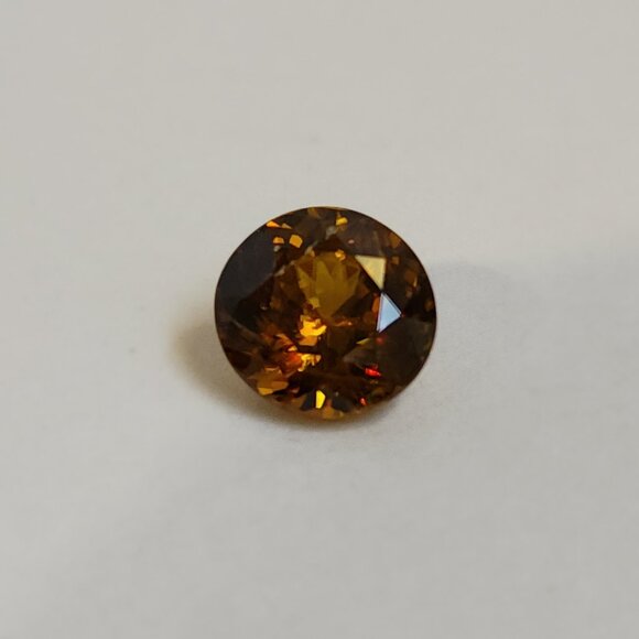 Sphene 7.18mm x 6.88mm x 4.30mm Oval 1.47ct Loose Gemstone - Picture 3 of 16